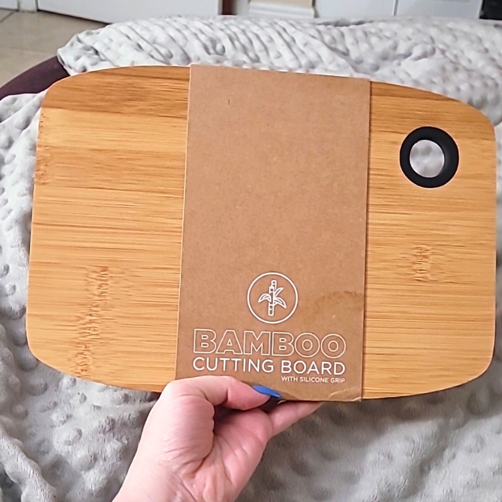 Bamboo cutting board with silicone grip - New with Princess Players Club Logo.